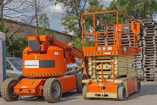 forklift truck transporting products in a warehouse in Marcus